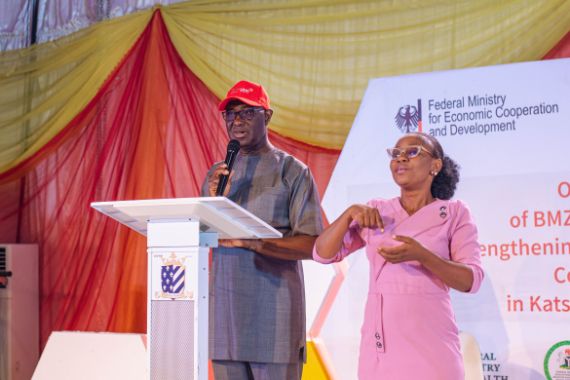 Bright Ekweremadu, the CBM regional director for West and Central Africa, and a sign language interpreter at the launch of the project.