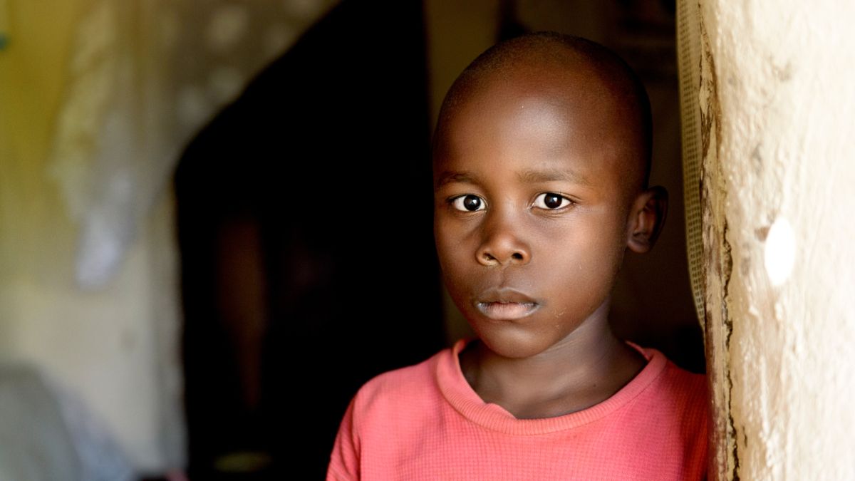 A boy looking directly into the camera