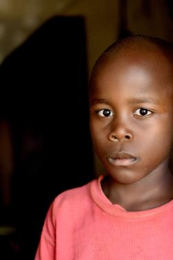 A boy looking directly into the camera