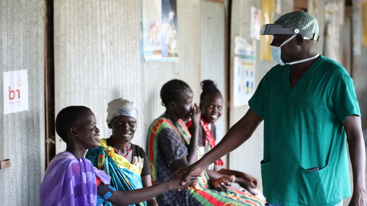 A man greets a woman 