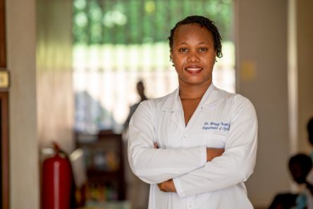 A woman in a doctor&#039;s lab coat