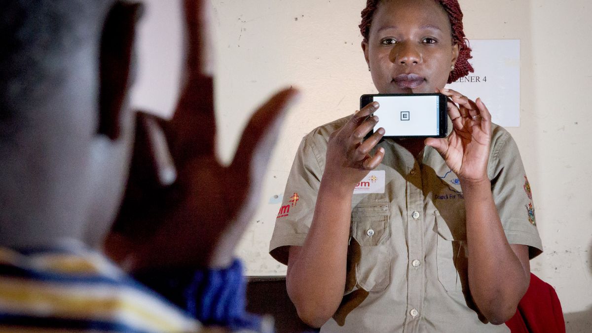 A woman holding a smartphone 